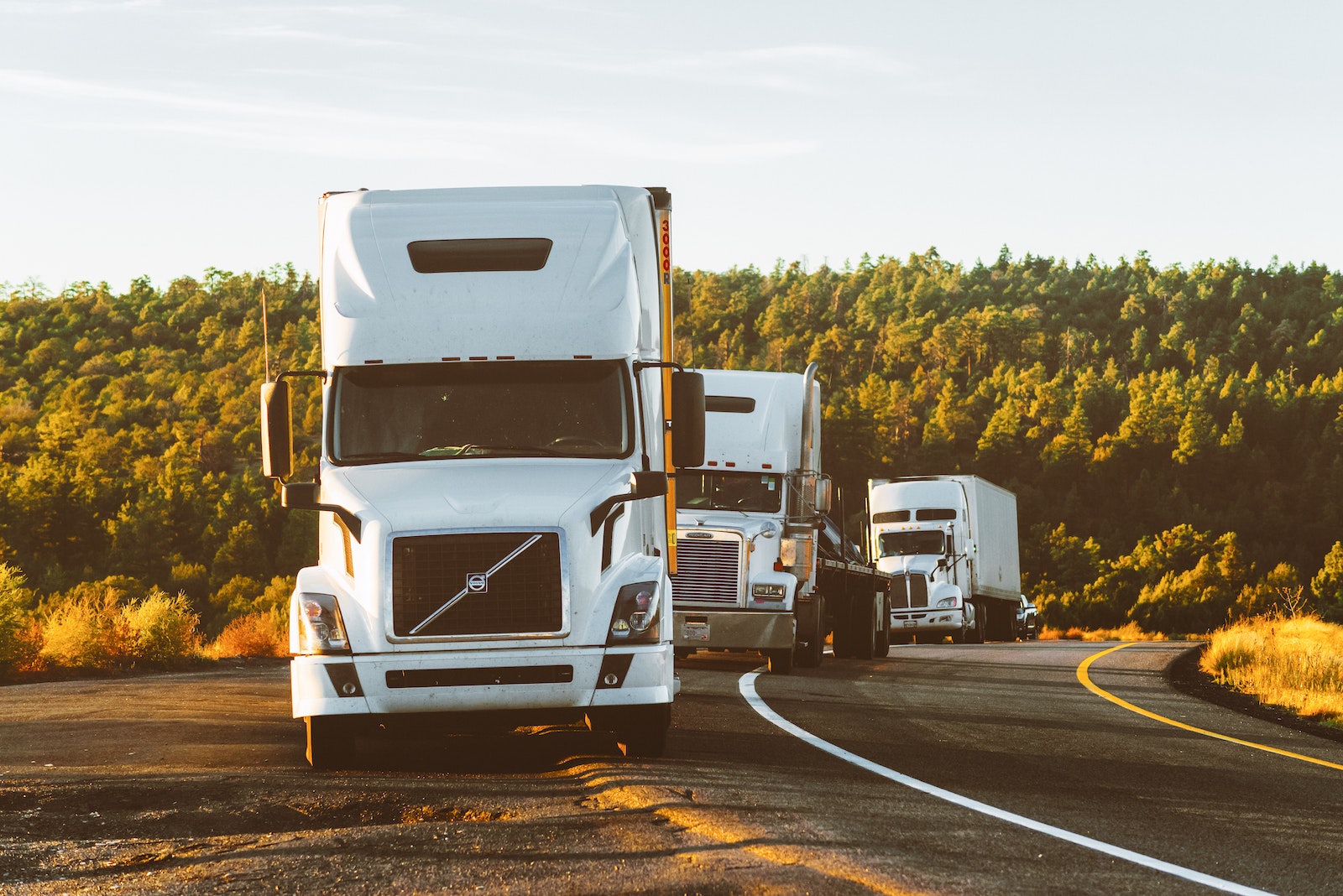 White Volvo Semi-truck on Side of Road