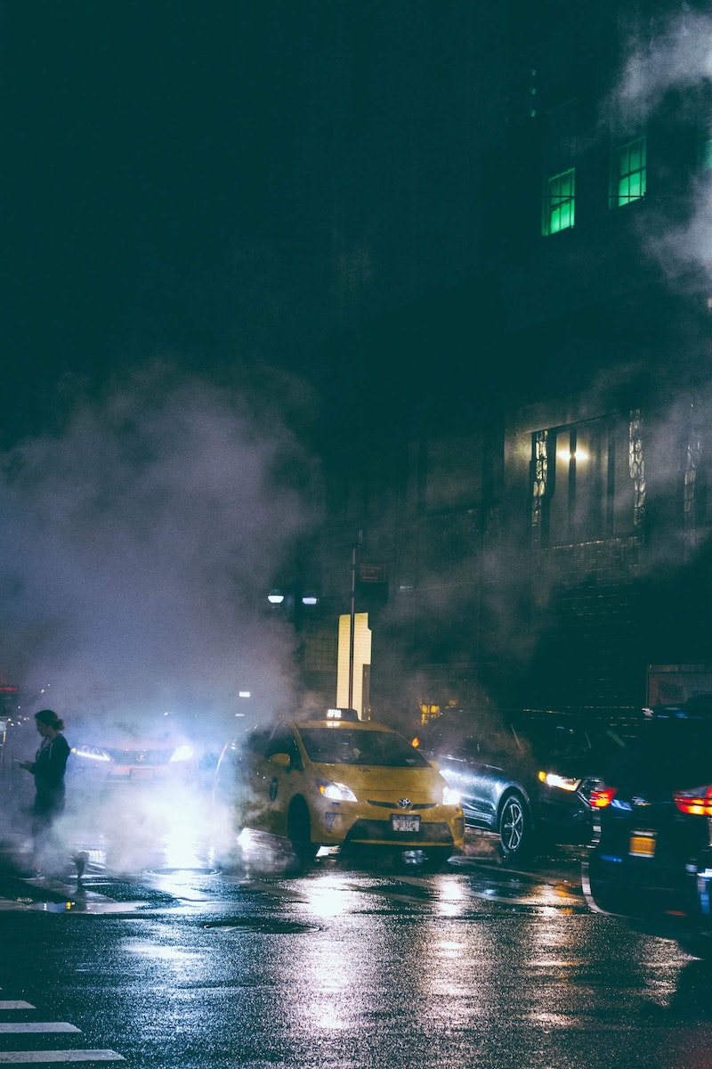 Photo of Vehicles on Road During Nighttime